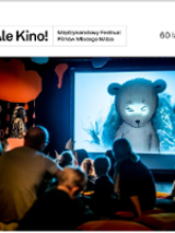 Photo of young audience watching movie on a big screen.