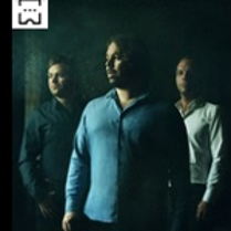 Photo of three members of the band