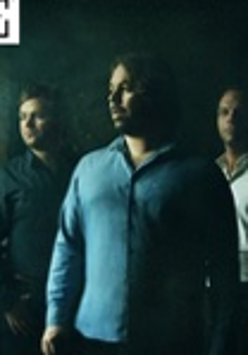 Photo of three members of the band