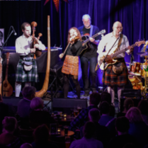 Photo of the band performing on stage