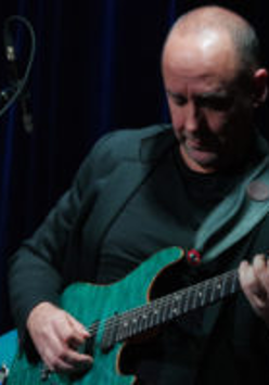 Photo of the guitarist Marek Napiórkowski
