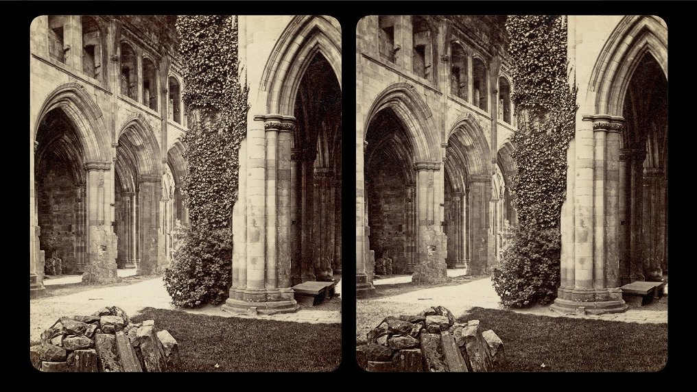 Stereophotograph of an interior of an abbey: walls with soaring arches.