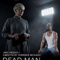 On the left there is a woman with short white hair and in a long gray dress, facing right. On the right sits a muscular man in a white T-shirt and light jeans. He looks at the woman. The setting is a prison cell.