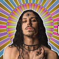 Colourful photo of Michał Szpak who is stylized as Christ with aureole