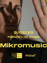 A photo of a face of a woman looking into the camera. Her left hand is raised, and her fingers cast a shadow across her face. This photo is a backdrop for information about the concert written in yellow font.