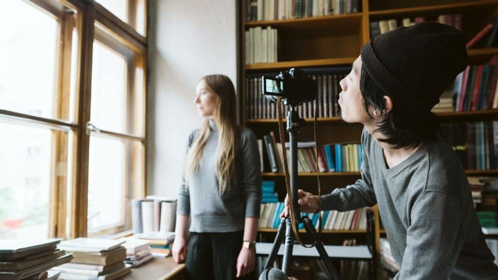 Masanori Matsuda at work at the "Celebration" exhibition in the Department of Music and Art of Raczyński Library during Poznań Art Week 2019. Photograph courtesy of Poznań University of Fine Arts.
