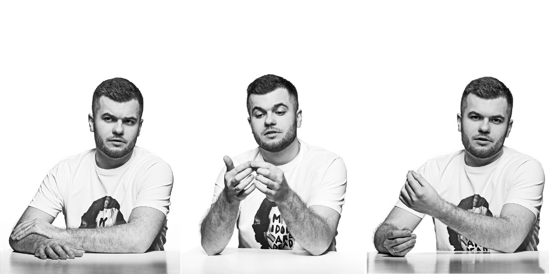 3 black and white photos of Łukasz Ojdana, gesturing with his hands with various facial expressions - grafika artykułu