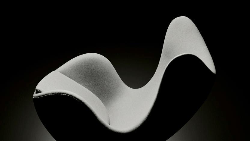 Black and white photo of a modern armchair - grafika artykułu