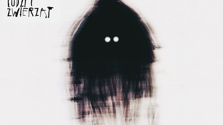 An album cover - black creature looking with white circle eyes on a white background. Black captions in left top corner