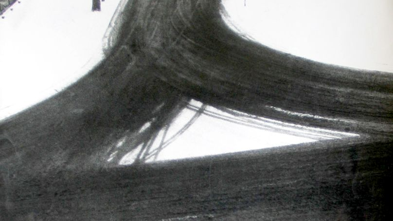 Black and white photo from the exhibition: black roads and covered with snow roadsides.