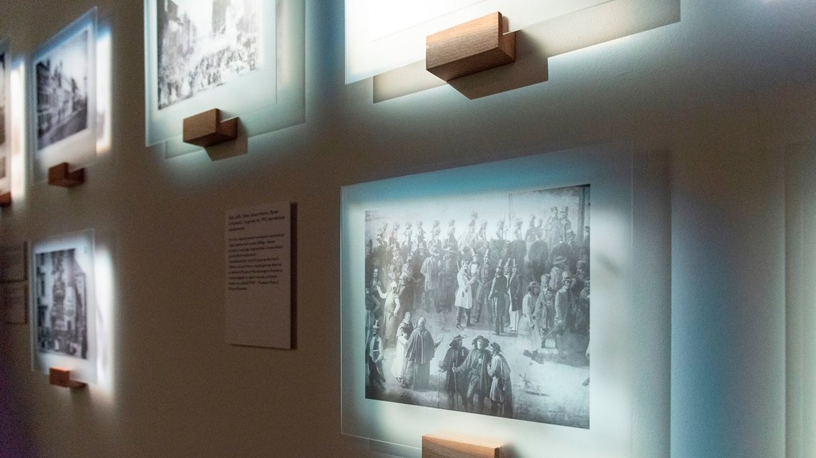 Photo from the exhibition - pictures on the wall.