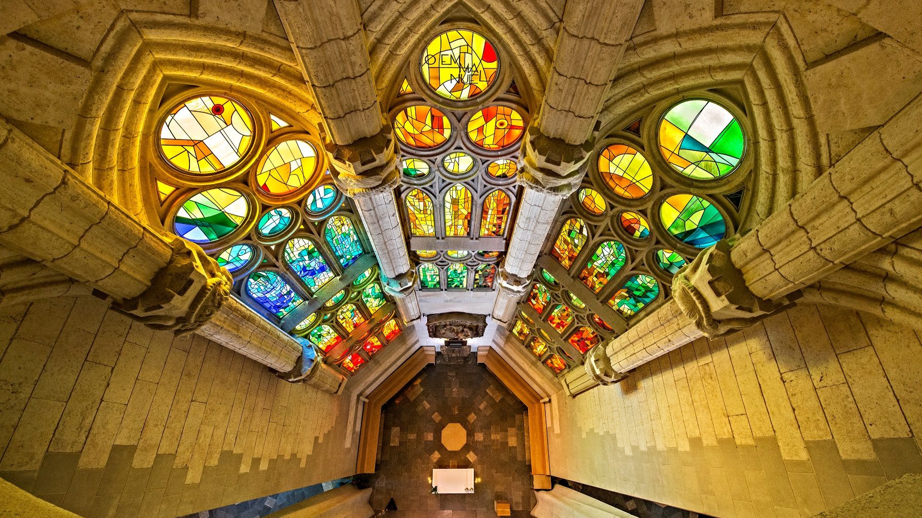 Picture of colourful stained glass windows seen from above