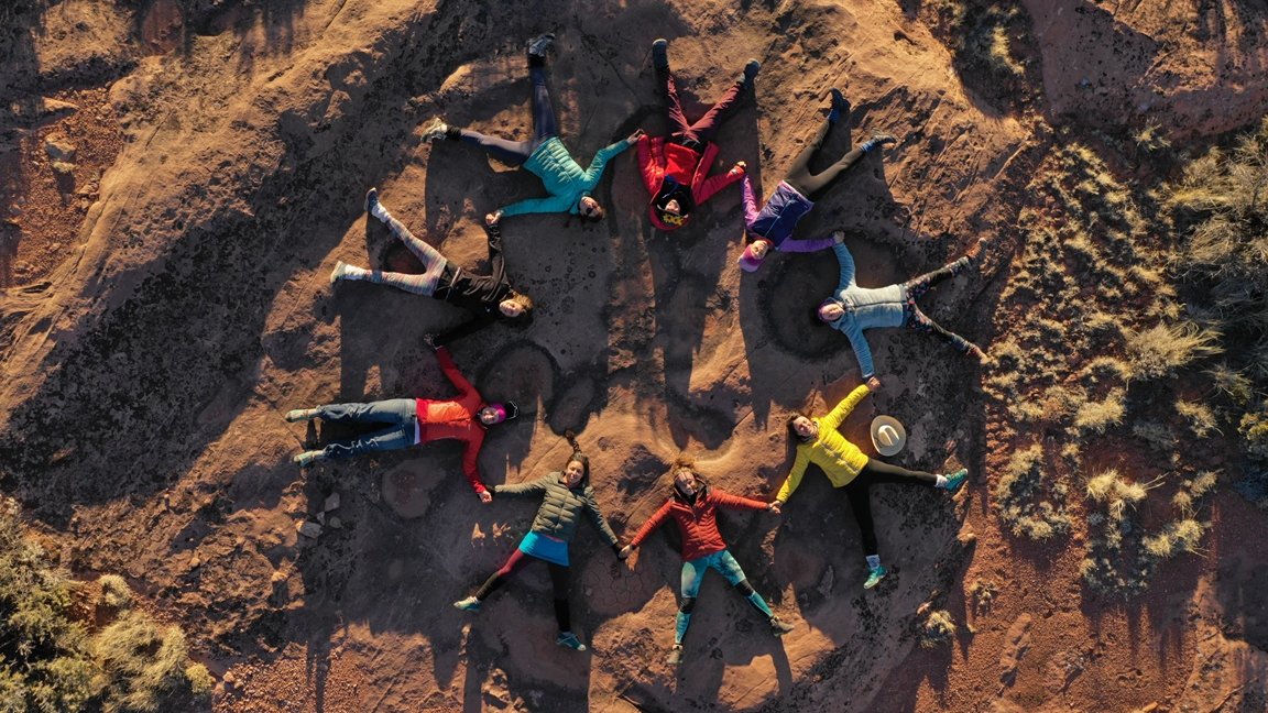 Photo from the movie - a circle made of women lying on a ground