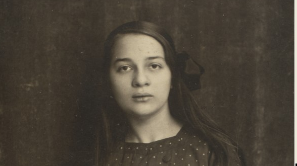 Photo of the artist in sepia colours.