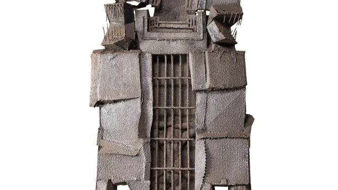 Photo of a sculpture on a white background.