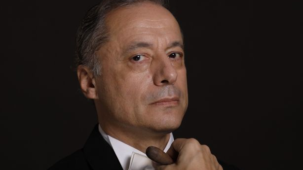 Photo of the conductor on a black background.