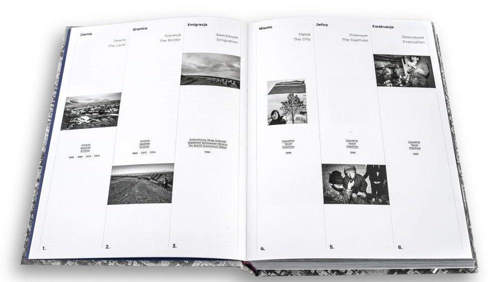 The inside of a book with a few black and white photos.