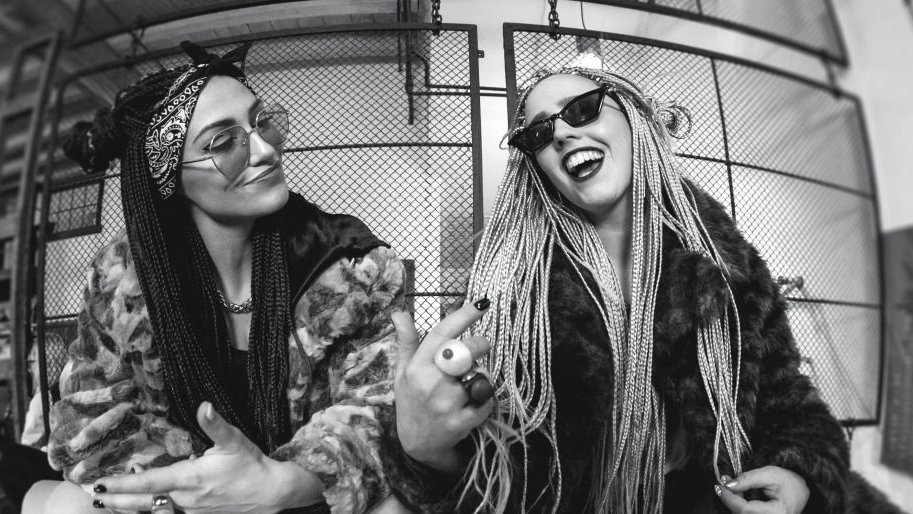 Black and white photo of two women.