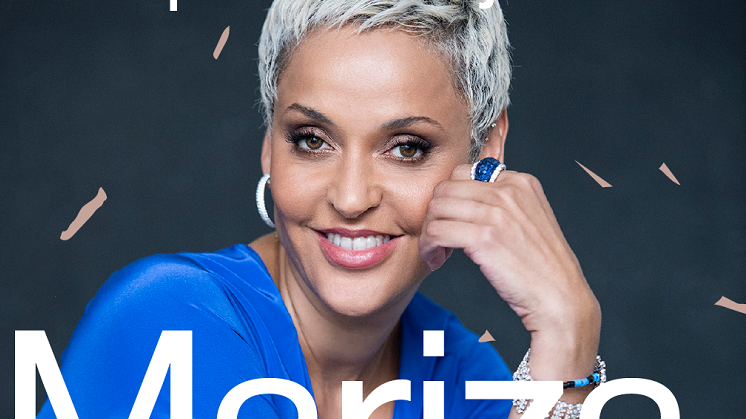 Concert poster: photo of smiling Mariza in blue dressand information about the event.
