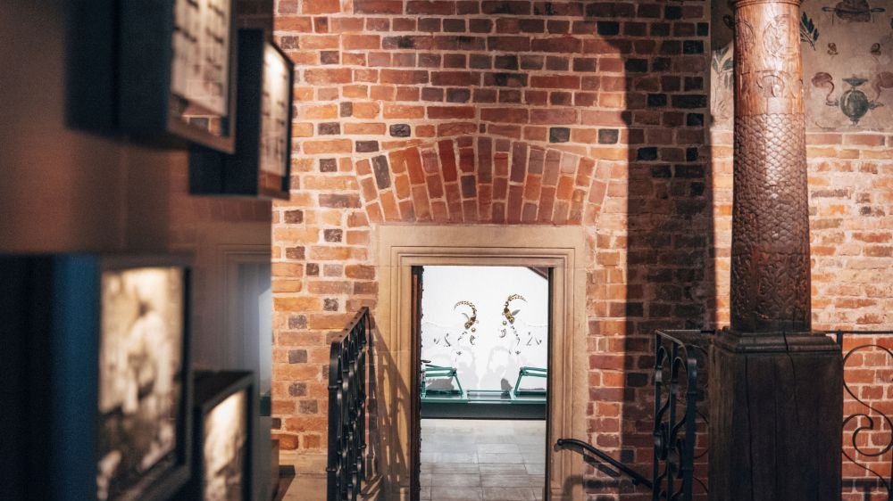 Stairs leading to the room with the mechanism of Poznań goats.