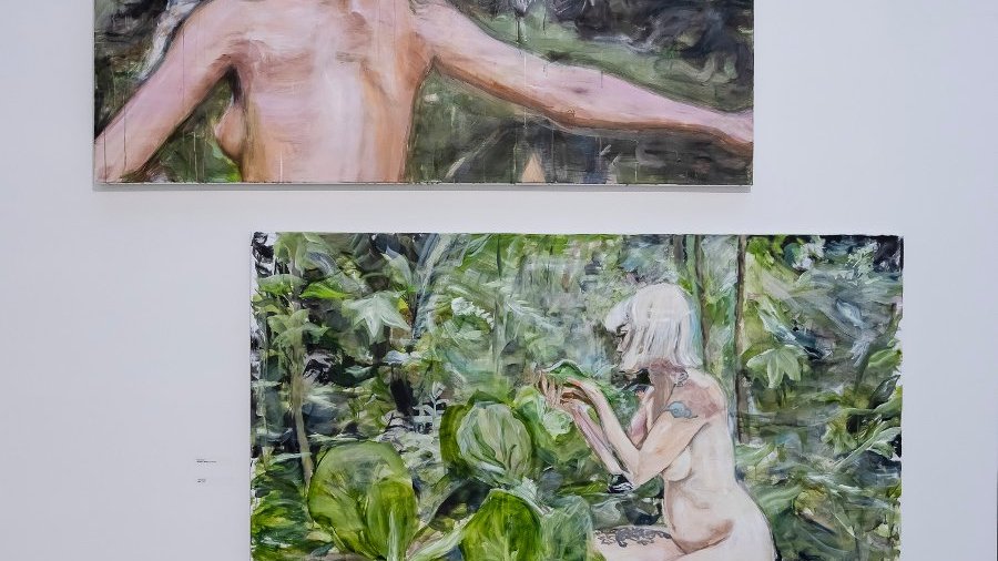 Two paintings one below the other. On one a naked woman turned backwards, on the other a naked woman kneeling among green plants.