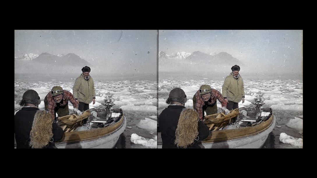 In the foreground, a boat and three men at it. The men are preparing the boat to sail. In the background, the sea and numerous ice floes on it, in the distance, a mountain partially covered with snow.