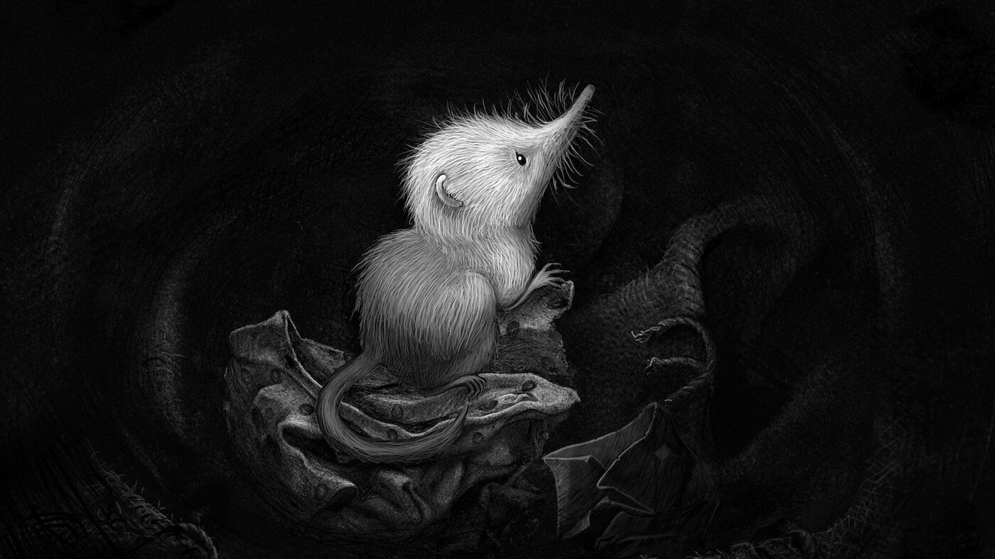 Black and white picture of a small fluffy and sad creature resembling mouse.