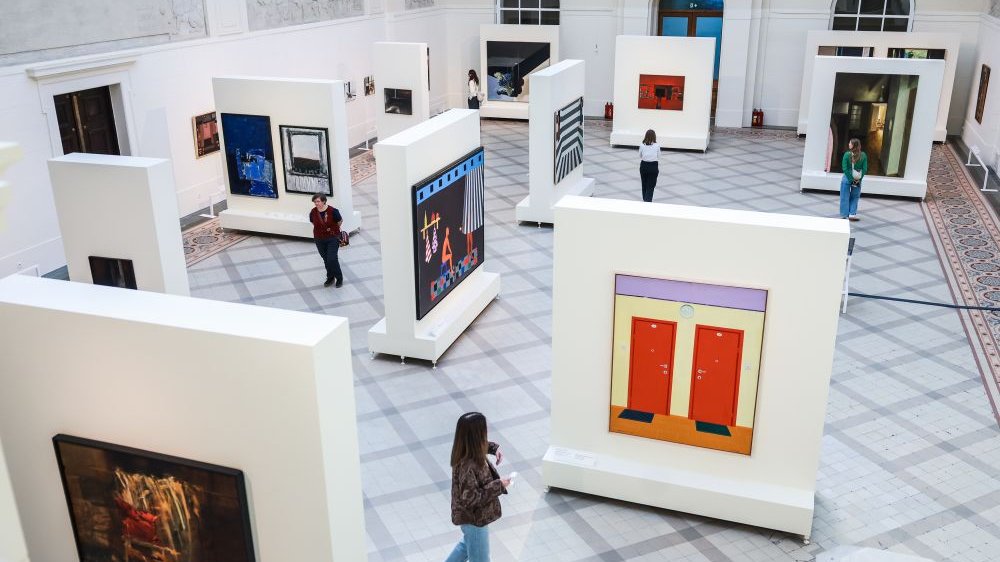 Top view of people walking through the exhibition.