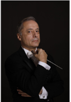 Photo of the conductor, Marco Guidarini.