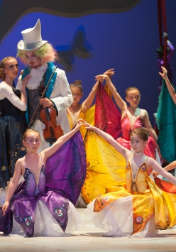 Scene from the performance: ballet dancers in colourful costumes
