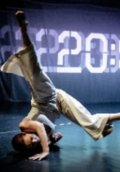 A photo of a dancer on a stage
