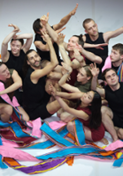 Photo from the performance: dancers close to each other in various poses.