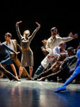 Photo from the performance: a group of dancers in various dance poses on stage.