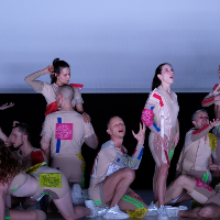 Photo from the performance - dancers in various poses.