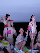 Photo from the performance - dancers in various poses.