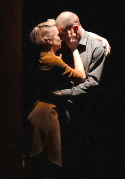 Photo from the performance: a couple in a hug