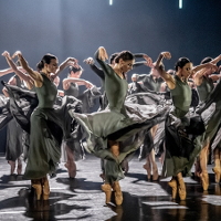 Photo from the performance: dancers in dance poses on stage.