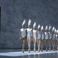 Photo frm the performance: a ballet dancers in white costumes in a row.