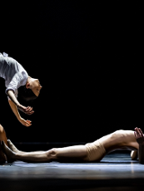 A picture from a ballet performance - a woman and a man in a dance pose