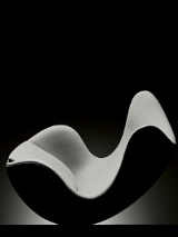 Black and white photo of an egg-shaped arm-chair