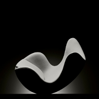 Black and white photo of an egg-shaped arm-chair