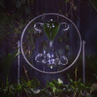 One of the works - a dark photo of an hourglass in a circle