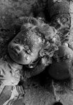 Black and white photo of two dolls covered with plaster.