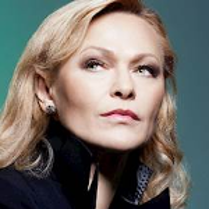 Photo of Edyta Geppert - a blond woman, who looks into the distance