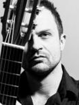 Black and white photo of the guitarist Krzysztof Meisinger