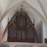 Photo of the pipe organ in a church.
