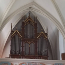 Photo of the pipe organ in a church.