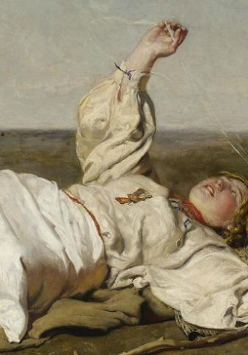 One of the pictures from the exhibition: a person in white garment lying on a ground and looking at the sky.