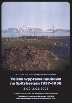 Exhibition poster. Square photograph of a landscape with a jagged rock in the foreground, a low wooden building in the background, and a strip of calm sea, mountains, and cloudless sky in the distance. Information about the exhibition below the photograph.