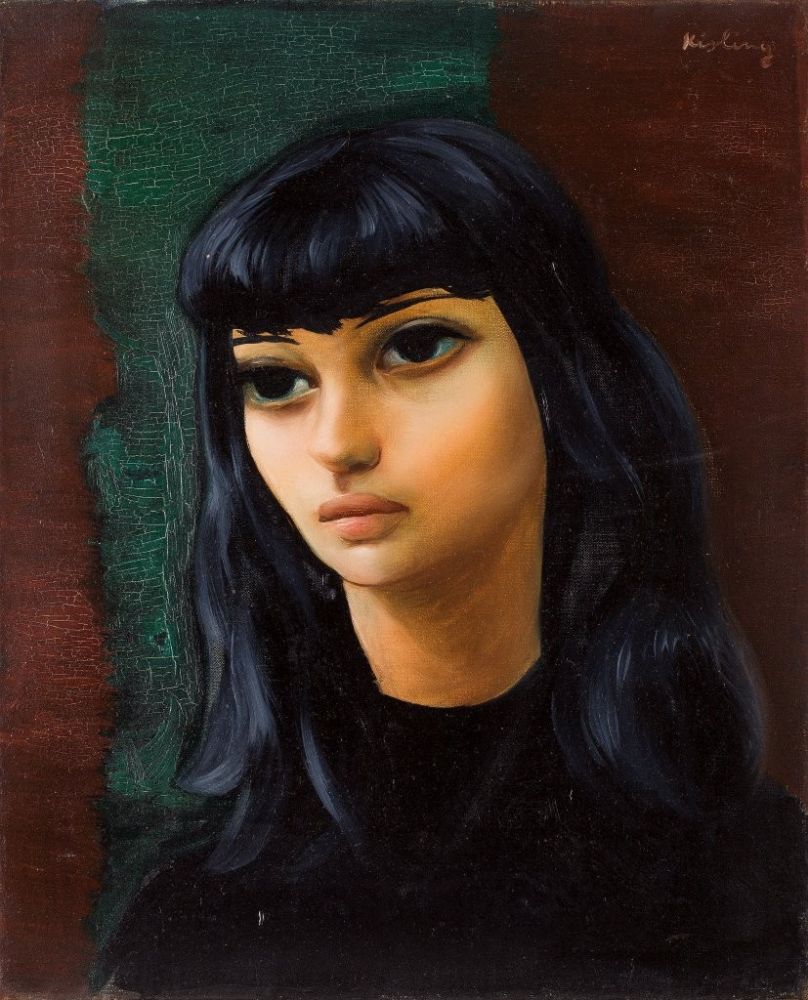 Portrait of a dark-haired girl in black clothing with distinctive large, dark eyes. Brown and green background.